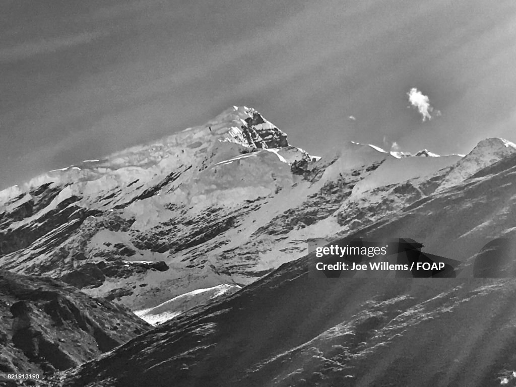 Snow covered mountain against sky