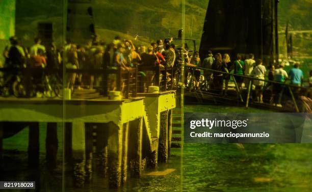 opening of ilhabela sailing week when the parade of sailboats happens in front of the píer da vila in ilhabela, brazil - píer stock pictures, royalty-free photos & images