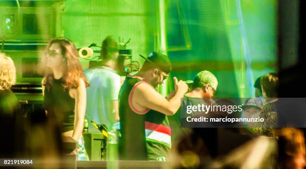 opening of ilhabela sailing week when the parade of sailboats happens in front of the píer da vila in ilhabela, brazil - píer stock pictures, royalty-free photos & images