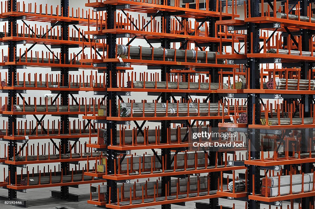 Industrial metal bars on huge racks