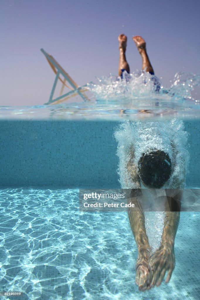 Man diving into pool