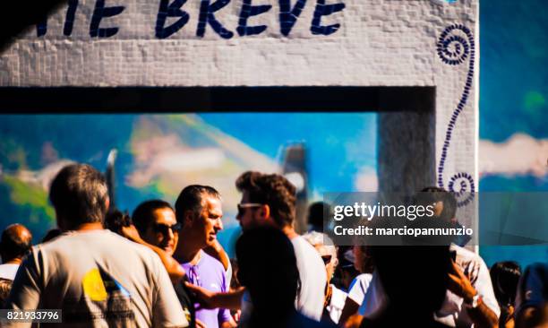 opening of ilhabela sailing week when the parade of sailboats happens in front of the píer da vila in ilhabela, brazil - píer stock pictures, royalty-free photos & images