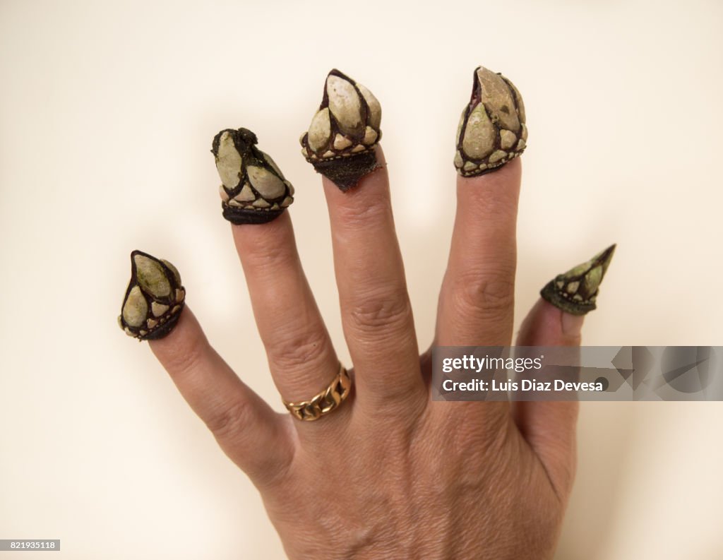 Woman with barnacles on her nails