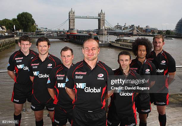 Saracens players Michael Owen, Andy Farrell, Glen Jackson, Steve Borthwick, Neil de Kock, Richard Haughton, Chris Jack pose during the Sarancens kit...