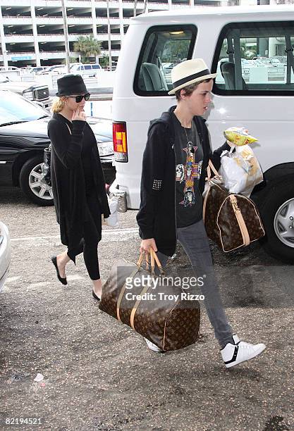 Lindsay Lohan and Samantha Ronson are seen at Miami International News  Photo - Getty Images