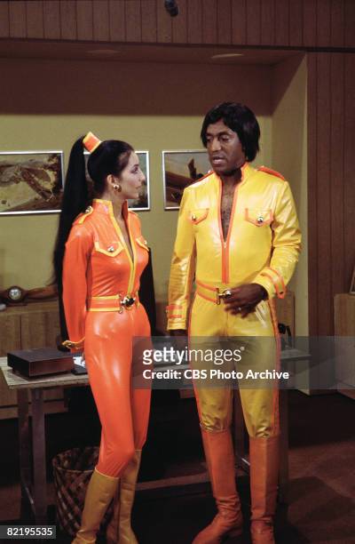 American singer and actress Cher and American actor and comedian Bill Cosby appear, in complimentary skin-tight costumes, in a skit from 'The Sonny &...