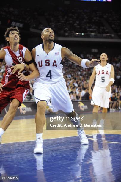 Carlos Boozer of the U.S. Men's Senior National Team and Kerem Gonlum of the Turkey National Team battle for position during a Pre-Olympic Friendly...