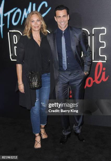 Actor Daniel Bernhardt and wife Lisa Stothard attend the premiere of Focus Features' 'Atomic Blonde' at The Theatre at Ace Hotel on July 24, 2017 in...