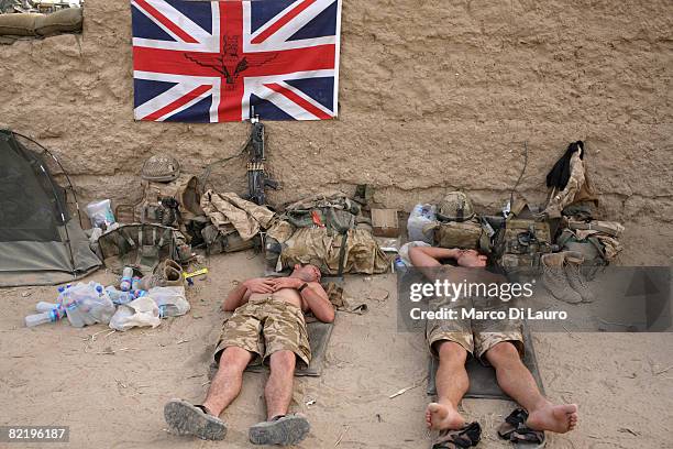 British Army soldiers from the 3rd Battalion The Parachute Regiment rest during operation Southern Beast on August 6, 2008 in Maywand District in...