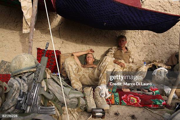 British Army soldiers from the 3rd Battalion The Parachute Regiment rest during operation Southern Beast on August 6, 2008 in Maywand District in...