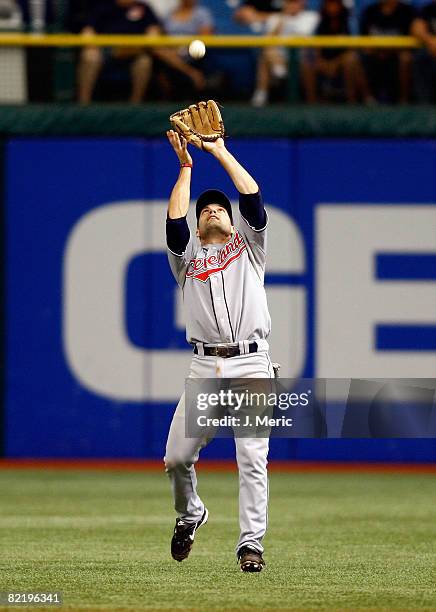 Infielder Jamey Carroll of the Cleveland Indians catches a fly ball against the Tampa Bay Rays during the game on August 6, 2008 at Tropicana Field...