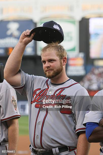 Brian McCann of the Atlanta Braves waves to the crowd before the 79th MLB All-Star Game at the Yankee Stadium in the Bronx, New York on July 15,...