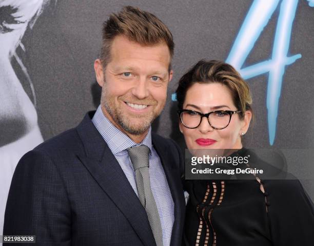 Director David Leitch and Kelly McCormick arriveat the premiere of Focus Features' "Atomic Blonde" at The Theatre at Ace Hotel on July 24, 2017 in...