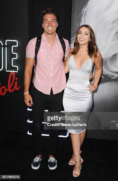 Dean Unglert and Ashley Iaconetti attend the premiere of "Atomic Blonde" at The Theatre at Ace Hotel on July 24, 2017 in Los Angeles, California.