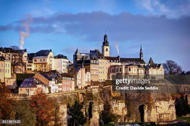 luxembourg city skyline with st michael church - luxemburg stock-fotos und bilder