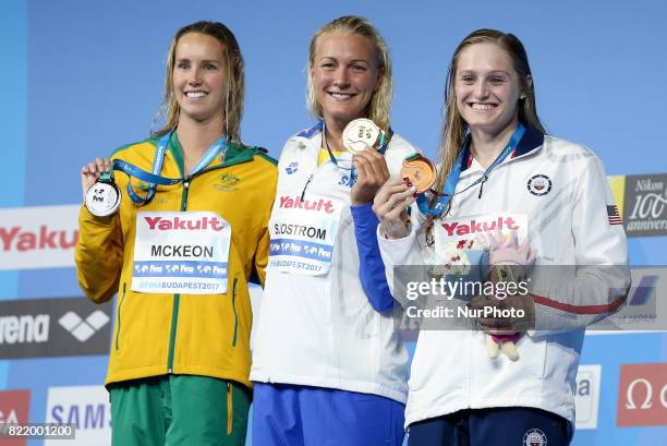 Award ceremony for the winners in 100m butterfly at the 17th FINA World Masters Championships in Budapest : silver medalist Emma McKeon , gold...