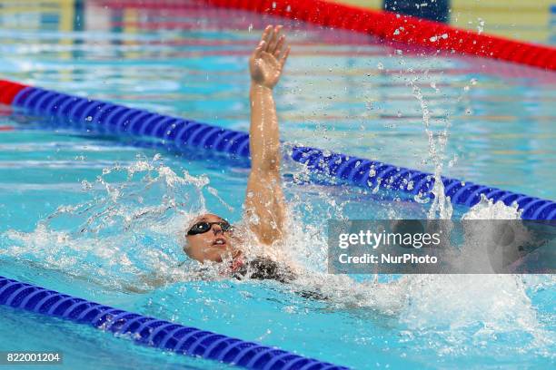 Mathilde Cini competes in a heat of the women's 100M Backstroke during the swimming competition at the 2017 FINA World Championships in Budapest, on...