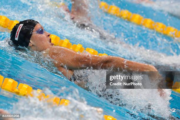 Olivia Smoliga competes in a heat of the women's 100M Backstroke during the swimming competition at the 2017 FINA World Championships in Budapest, on...