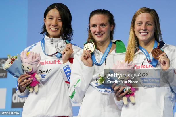 Madisyn Cox , Hungary's Katinka Hosszu and Japan's Yui Ohashi celebrate on the podium after the women's 200m Individual Medley final during the...