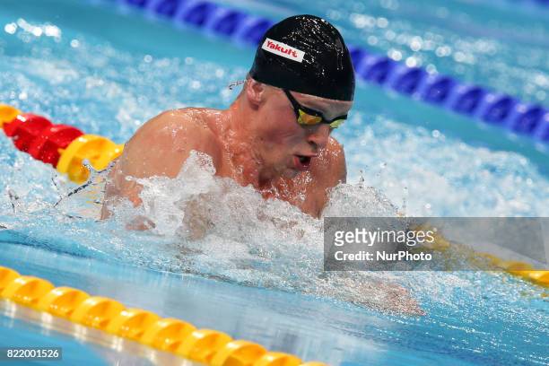 Adam Peaty of Britain competes in the men's 100m backstroke at the 17th FINA World Masters Championships in Budapest.