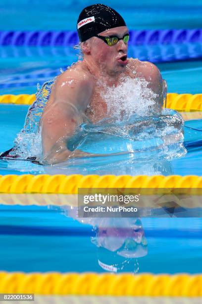 Adam Peaty of Britain competes in the men's 100m backstroke at the 17th FINA World Masters Championships in Budapest.