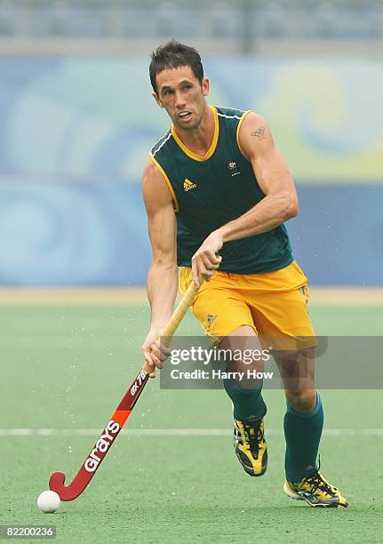 Mark Knowles of Australia dribbles the ball during practice at the Olympic Green Hockey Field ahead of the Beijing 2008 Olympics on August 7, 2008 in...