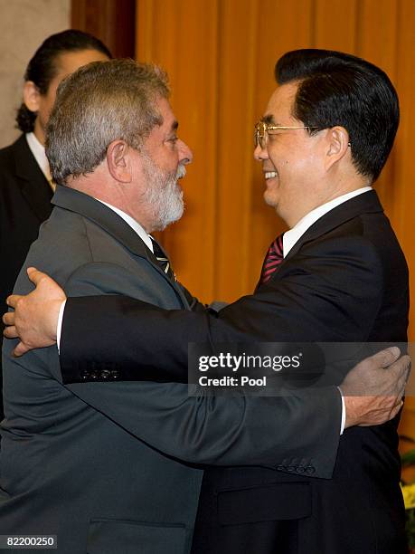 Brazilian President Luiz Inacio Lula da Silva meets with Chinese President Hu Jintao at the Great Hall of the People August 7, 2008 in Beijing,...