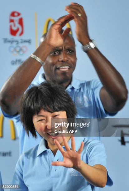 Oly-2008-Athletics-Lewis,INTERVIEW by Luke Phillips Former long-distance runner and Olympic champion, Wang Junxia of China, and retired track and...