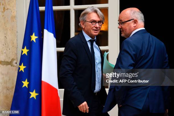 French Force Ouvriere labour union General Secretary Jean-Claude Mailly and federal secretary Michel Beaugas arrive to attend a meeting with French...