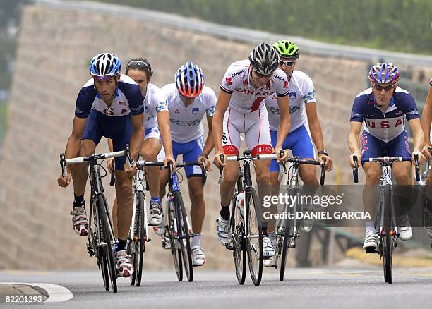 Road cyclists from different countries take part in an official training session near the Great Wall of China in Badaling, 78 km north of Beijing on...