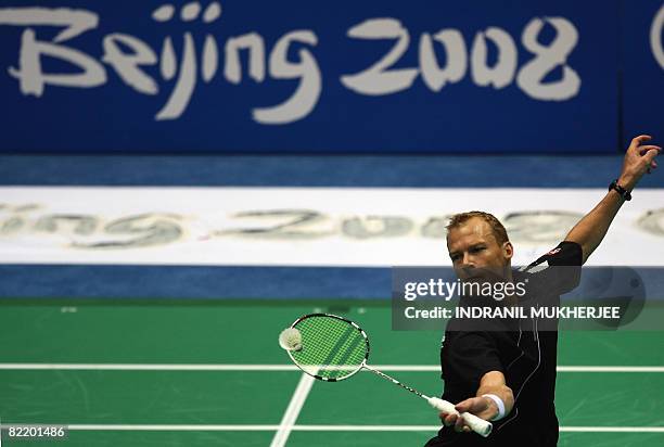 Denmark's Keneth Jonassen plays a shot during a training session in Beijing, on August 7, 2008 on the eve of the opening ceremony of the 2008 Beijing...