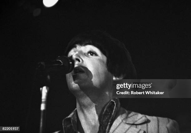 Paul McCartney performing at an evening show with the Beatles at the Rizal Memorial Football Stadium, Manila, Philippines, during the group's final...