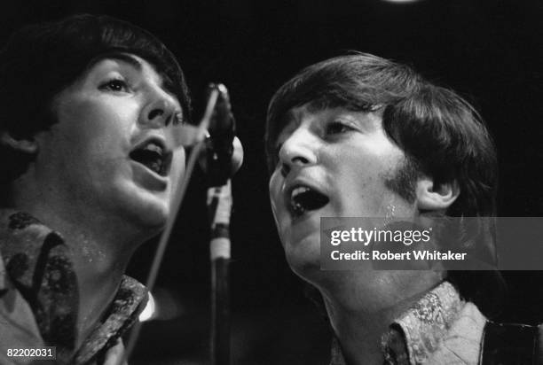 Paul McCartney and John Lennon performing with the Beatles at the Rizal Memorial Football Stadium, Manila, Philippines, during the group's final...