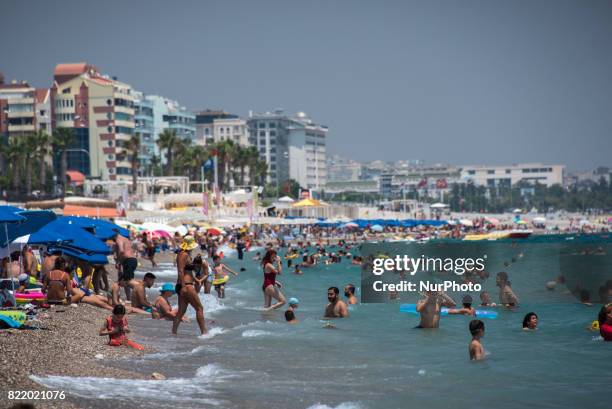 Beach Tourism in Antalya, Turkey, on 25 July 2017. Antalya, the largest city on Turkey's Mediterranean coast, is normally a popular summer...