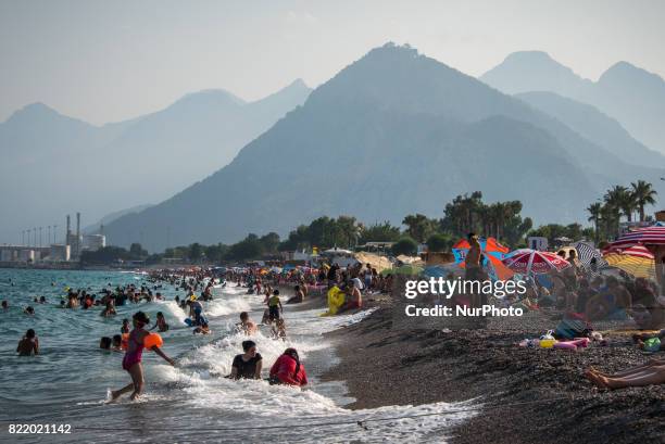 Beach Tourism in Antalya, Turkey, on 25 July 2017. Antalya, the largest city on Turkey's Mediterranean coast, is normally a popular summer...