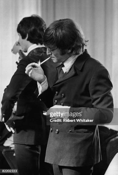 Paul McCartney and John Lennon backstage before a concert at the Grugahalle in Essen during the German leg of the Beatles' final world tour, 25th...