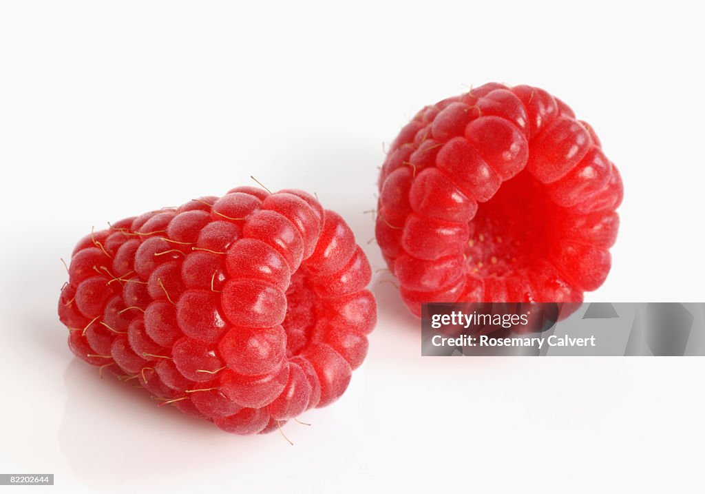 Two red, ripe raspberries