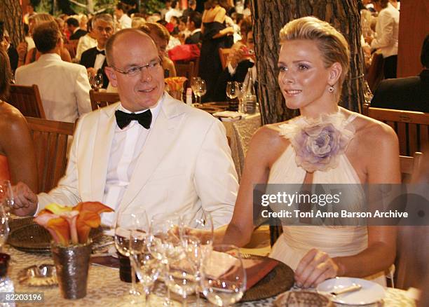 Prince Albert II of Monaco and Charlene Wittstock attend the 60th Monaco Red Cross Ball at the Monte-Carlo Sporting Club on August 1, 2008 in Monte...