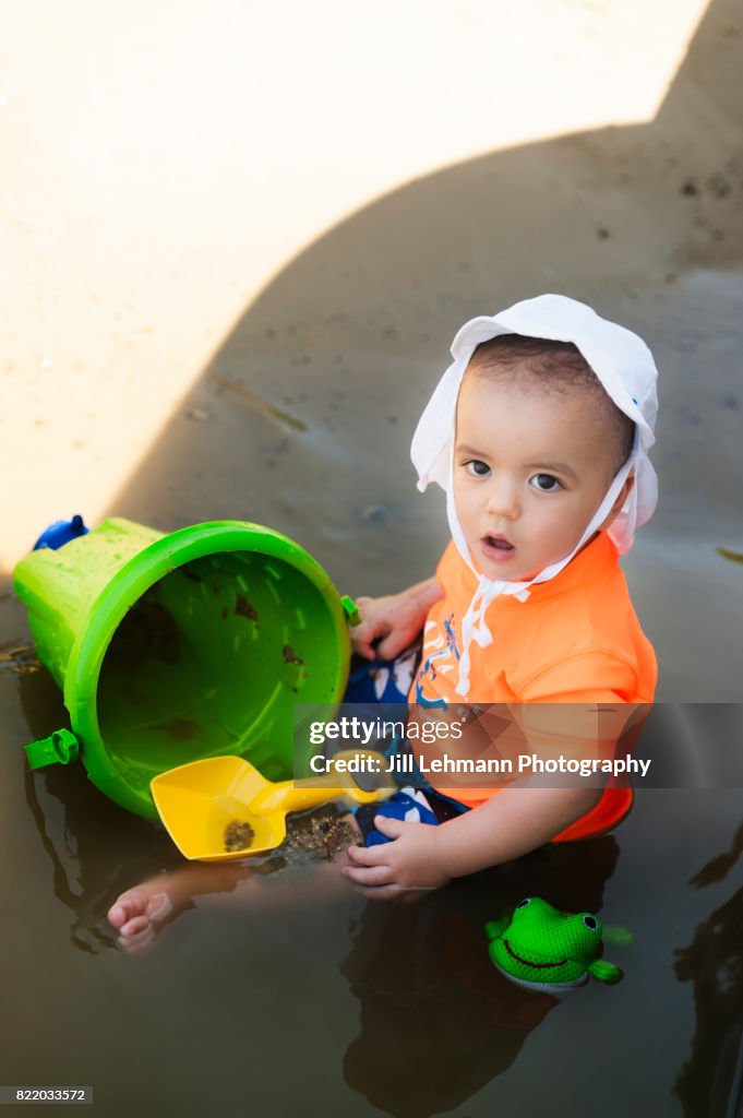12 Month Old Baby Plays on Beach