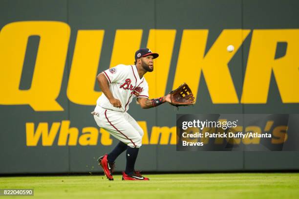 Danny Santana of the Atlanta Braves fields a ball against the San Francisco Giants at SunTrust Park on June 19, 2017 in Atlanta, Georgia. The Braves...