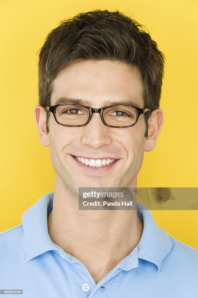 Young man smiling, portrait