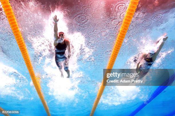 Federica Pellegrini of Italy and Yanhan Ai of China competes during the Women's 200m Freestyle Heats on day twelve of the Budapest 2017 FINA World...