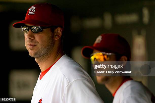 Pitchers Chris Carpenter and Adam Wainwright both of the St. Louis Cardinals watch their team play the Los Angeles Dodgers at Busch Stadium August 7,...