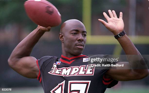 Temple University's quarterback Devin Scott tosses around a football, Tuesday, August 24, 1999 during media day at the Temple University's football...