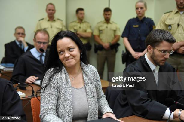 Beate Zschaepe, the main defendant in the marathon NSU neo-Nazi murder trial sits next to her lawyer Mathias Grasel in court on the day federal...