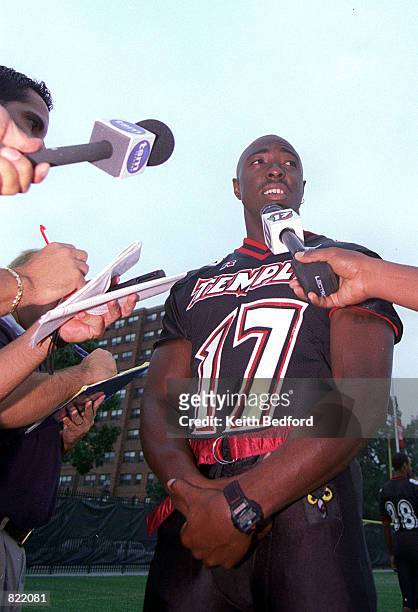 Temple University's quarterback Devin Scott talks to reporters, Tuesday, August 24, 1999 during media day at the Temple University's football...