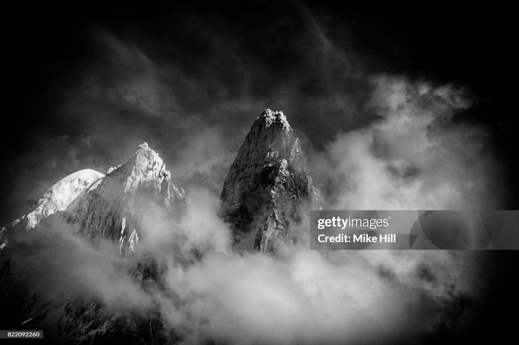 View of The Chamonix Needles through the clouds, French Alps