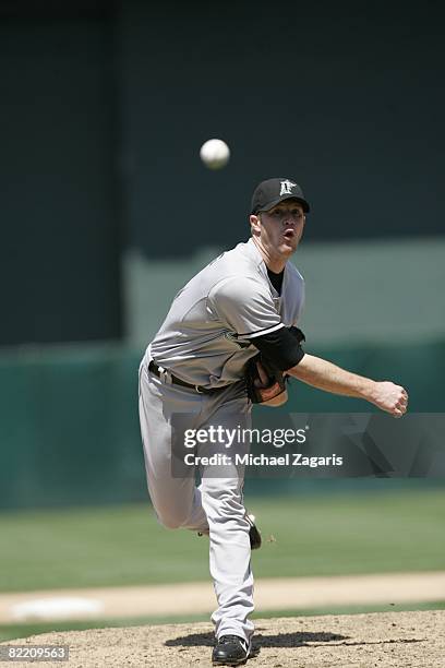 Logan Kensing of the Florida Marlins pitches during the game against the Oakland Athletics at McAfee Coliseum in Oakland, California on June 22,...