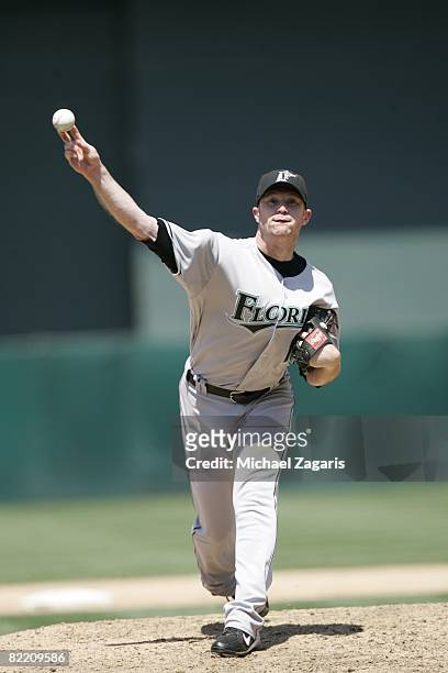 Logan Kensing of the Florida Marlins pitches during the game against the Oakland Athletics at McAfee Coliseum in Oakland, California on June 22,...