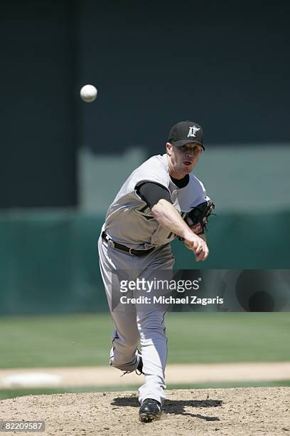 Logan Kensing of the Florida Marlins pitches during the game against the Oakland Athletics at McAfee Coliseum in Oakland, California on June 22,...